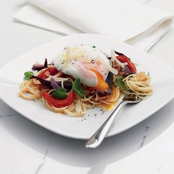 Roasted onion and tomato spaghetti with poached egg
