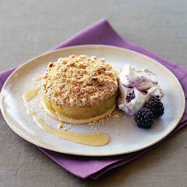 Spicy apple and pear crumbles with blackberry cream