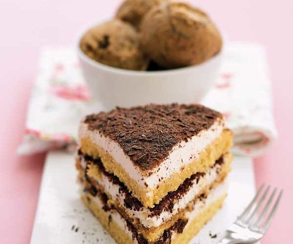 Image of tiramisu with coffee ice-cream behind