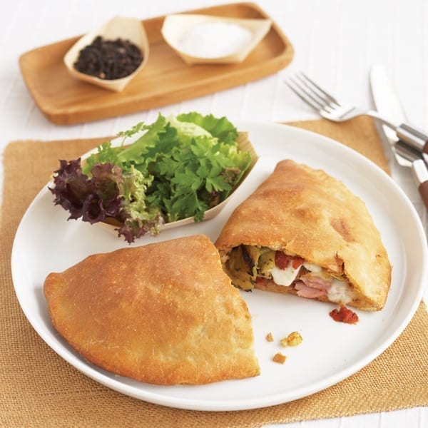 Ham and grilled artichoke calzone