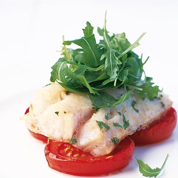 Roasted herbed cod with oven-dried tomatoes and rocket salad