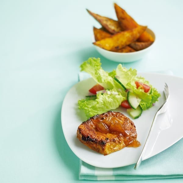 Tikka pork chops with Bombay-spiced sweet potato wedges