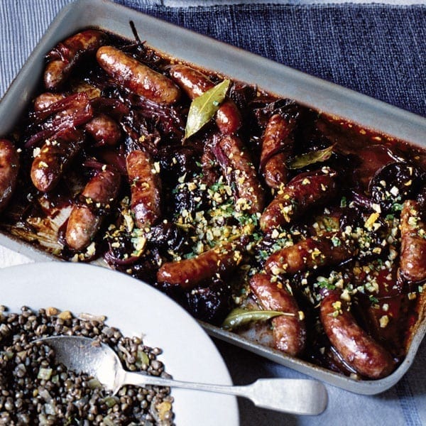 Baked sausages with prunes and walnut gremolata