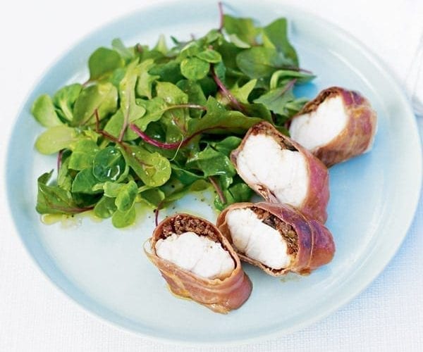Monkfish wrapped in parma ham shown on a plate