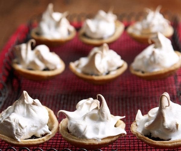 Meringue-topped mince pies in a tin