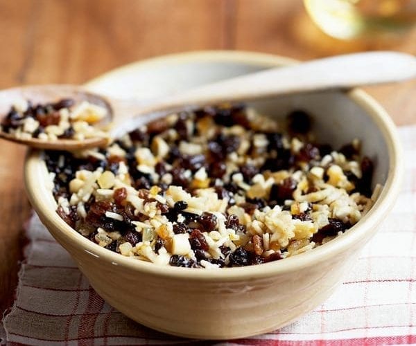 Mincemeat filling in a bowl with a spoon on top