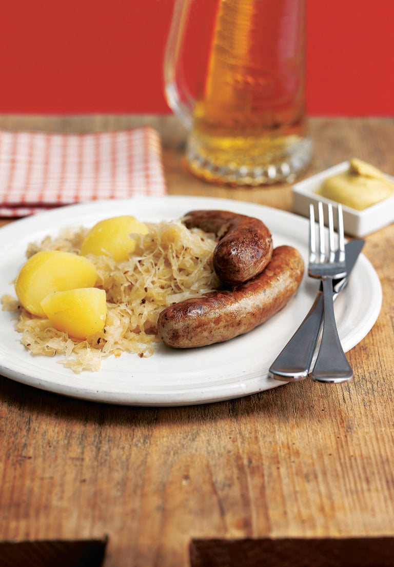 Sauerkraut cooked in Riesling with apples and sausages