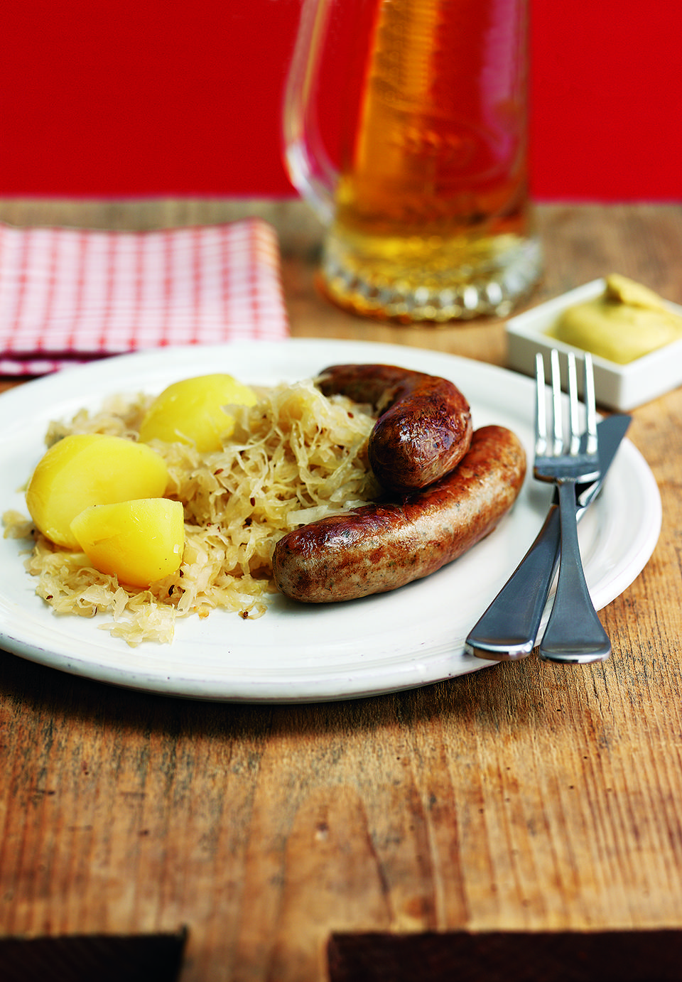 Sauerkraut cooked in Riesling with sausages recipe delicious. magazine