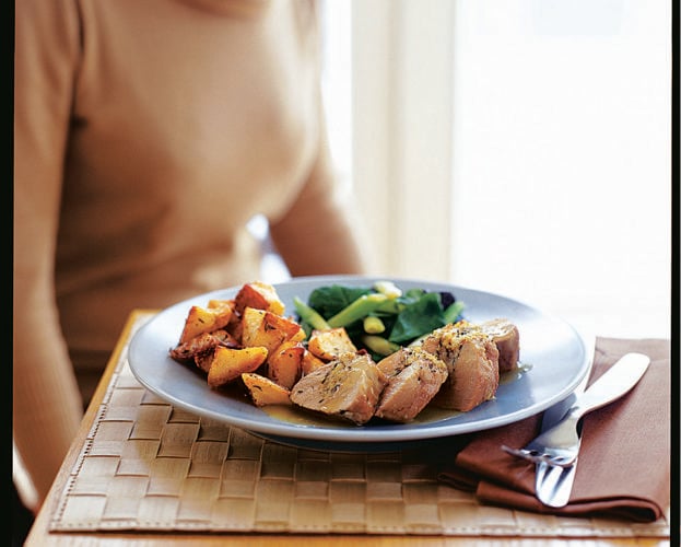 Roast pork stuffed with orange and thyme