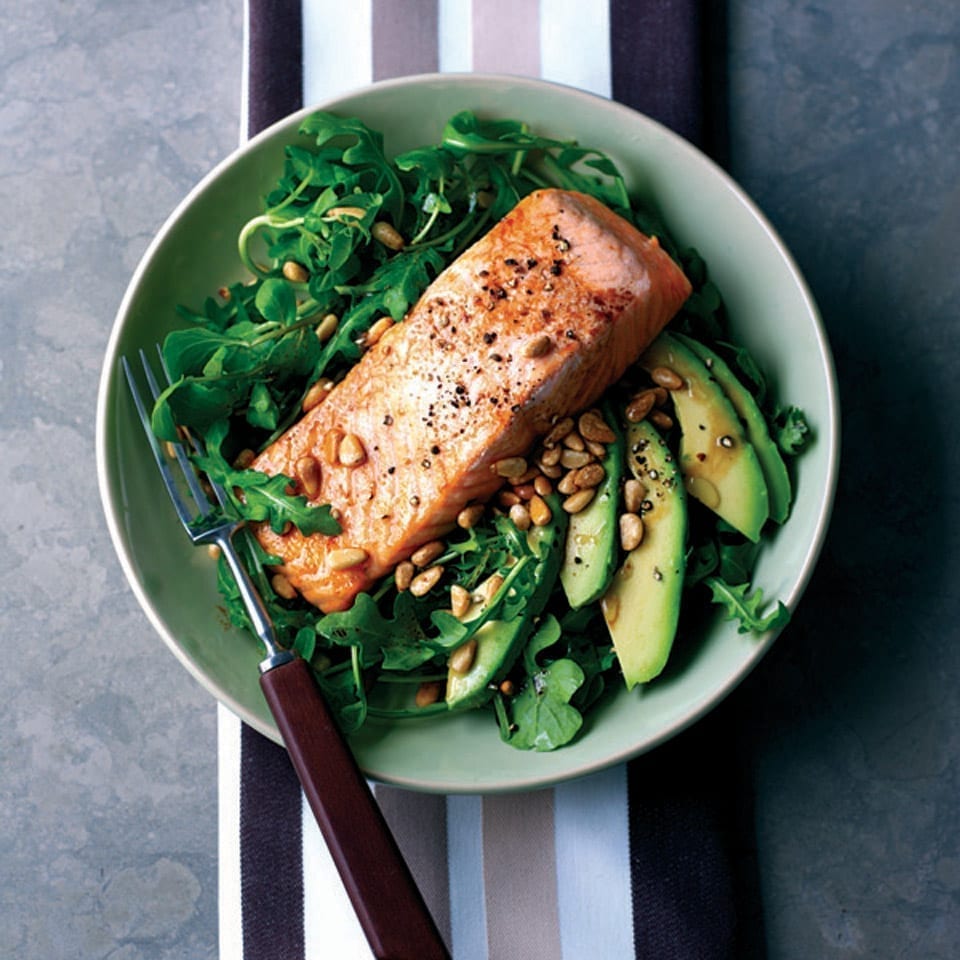Grilled salmon with rocket, avocado and pine nut salad recipe