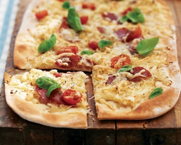 Sauerkraut, tomato and salami pizza