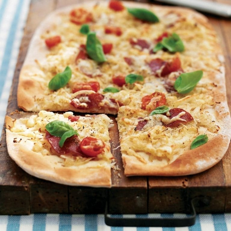 Sauerkraut, tomato and salami pizza