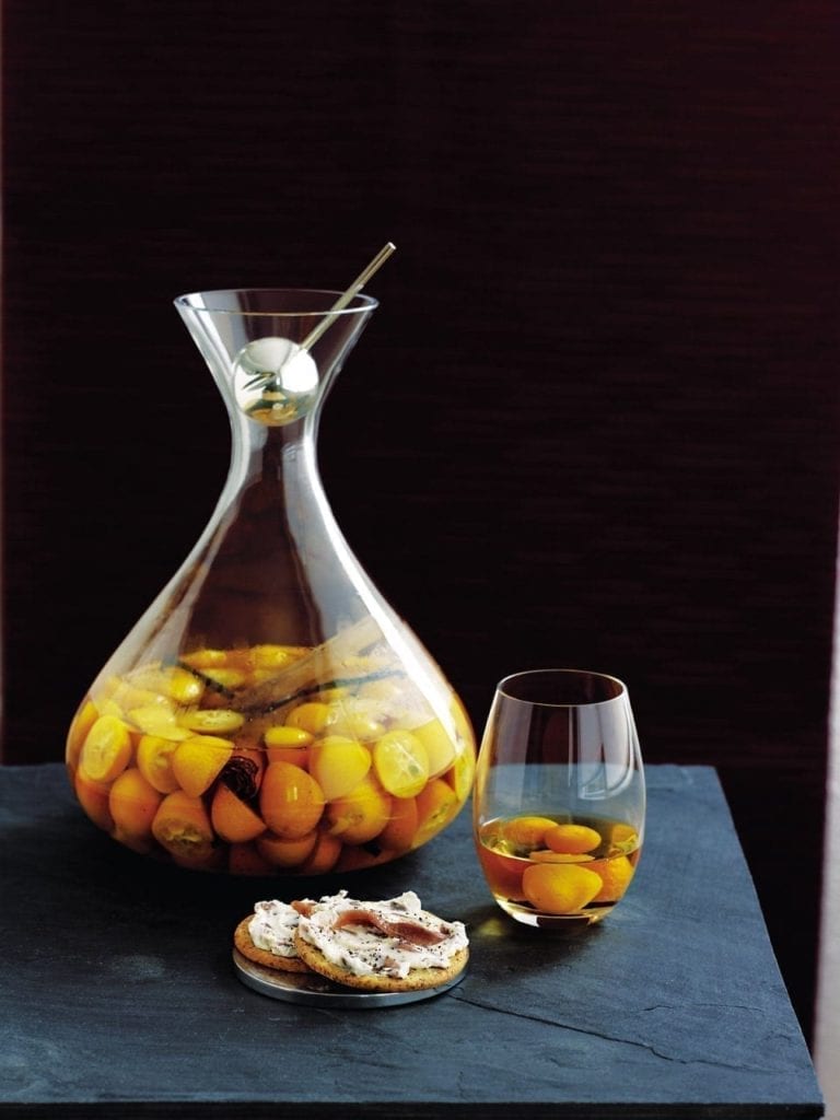 Spiced whisky with kumquats