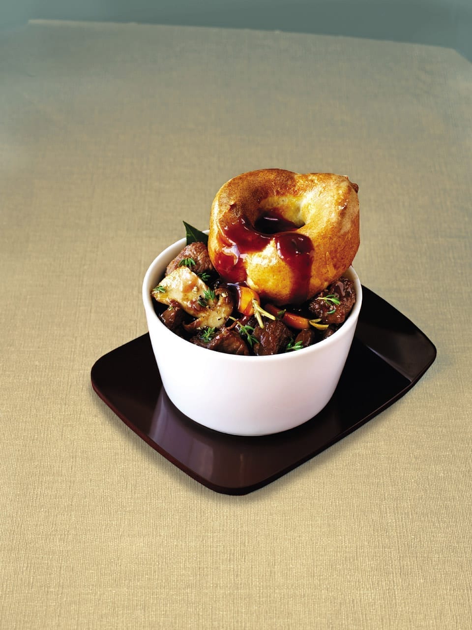 Beef stew with Yorkshire puddings delicious. magazine