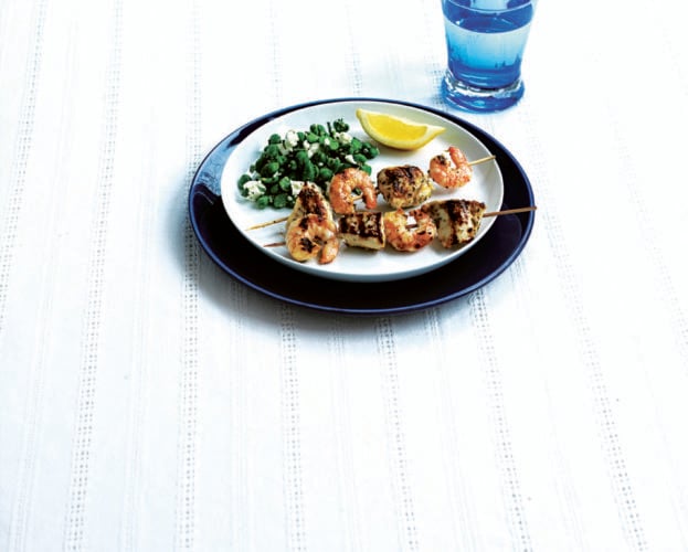 Prawn and chorizo skewers with yogurt, chickpeas and rocket