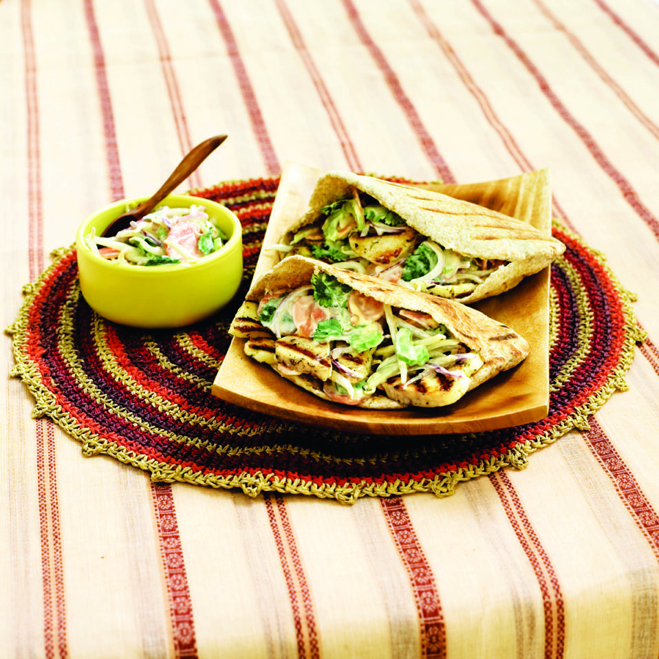 Barbecued halloumi and coleslaw pittas recipe | delicious. magazine