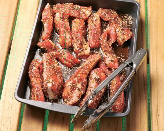 Quick marinade shown used on some spare ribs in a tray