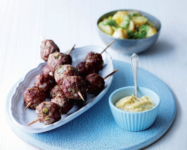 Triple-tomato pilaf with lamb kebabs