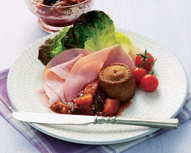 Spiced plum chutney shown with cold cuts of meat