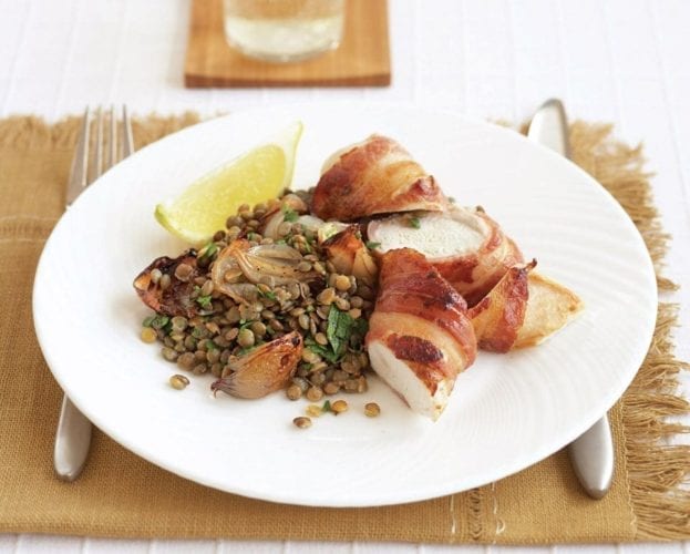 Bacon-wrapped chicken with dressed lentils