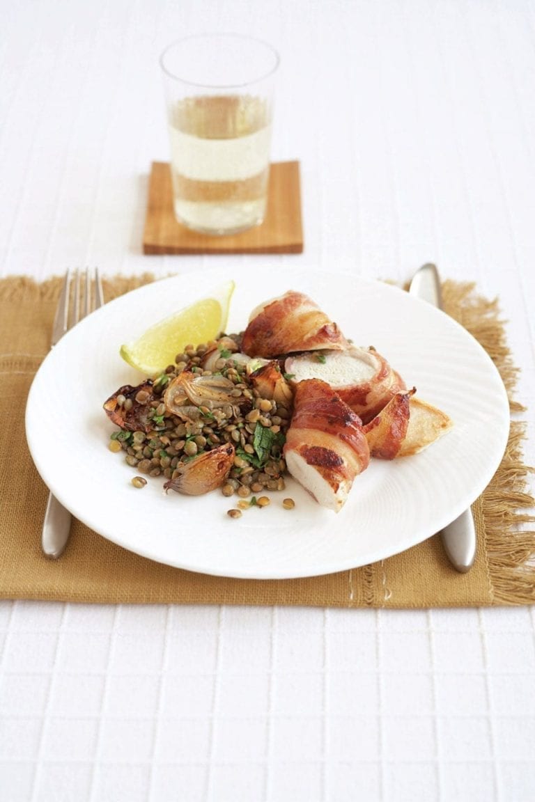 Bacon-wrapped chicken with dressed lentils