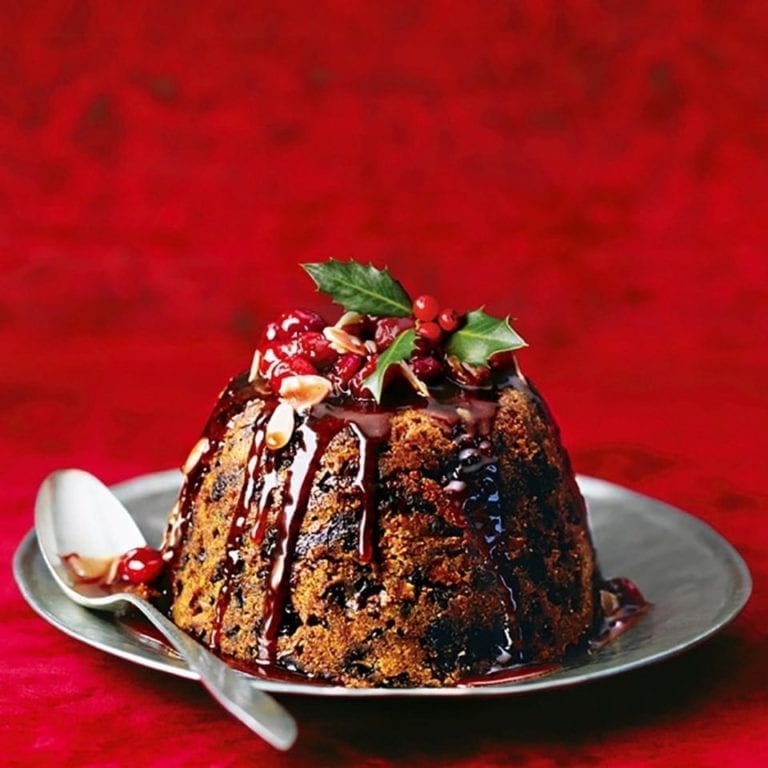 Chocolate Christmas pudding with cranberry toffee sauce