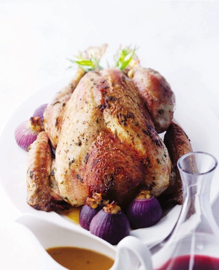 Roast turkey with stuffing-filled onions