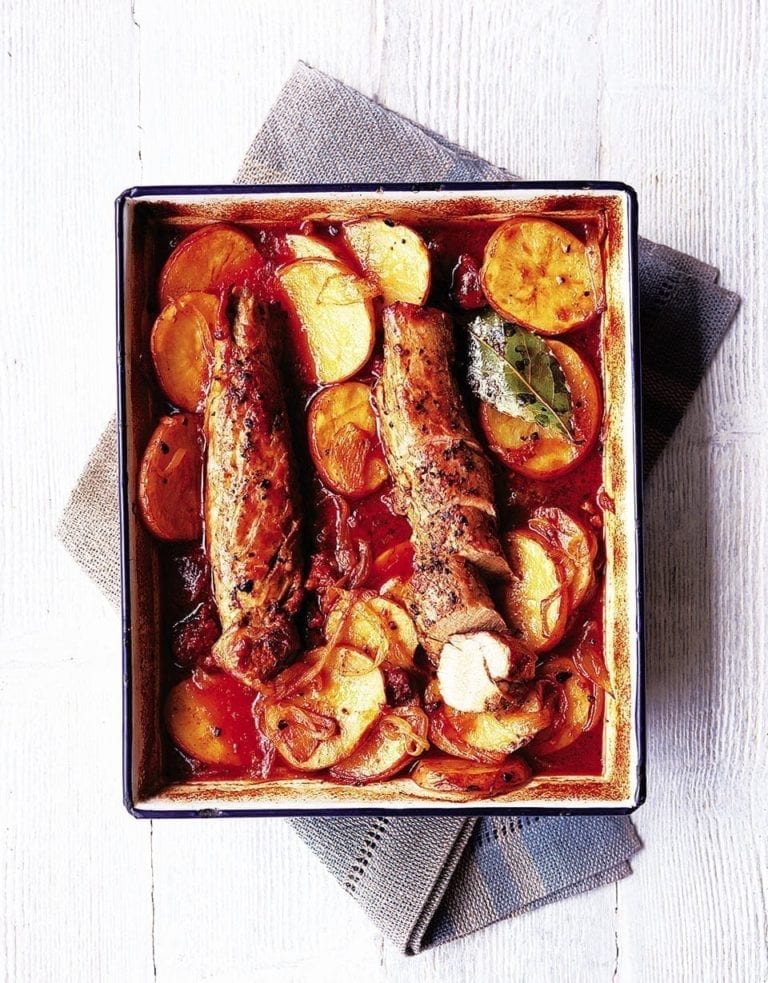 Juniper pork fillet with potatoes and smoked sausage