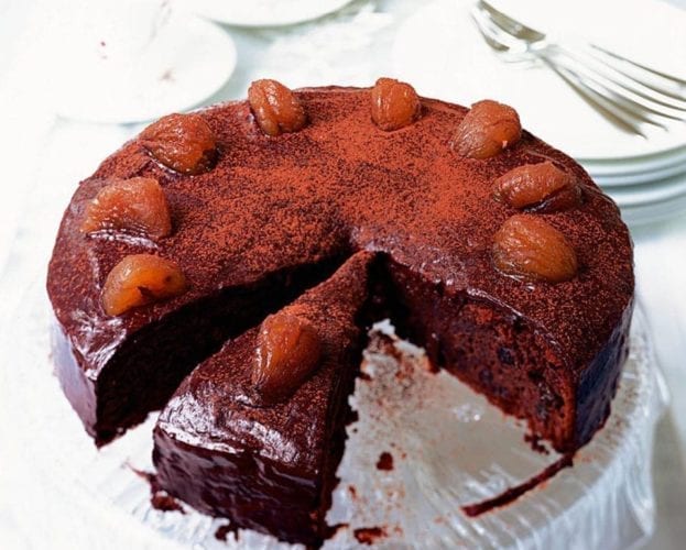 Round rum and raisin cake, with a slice taken out