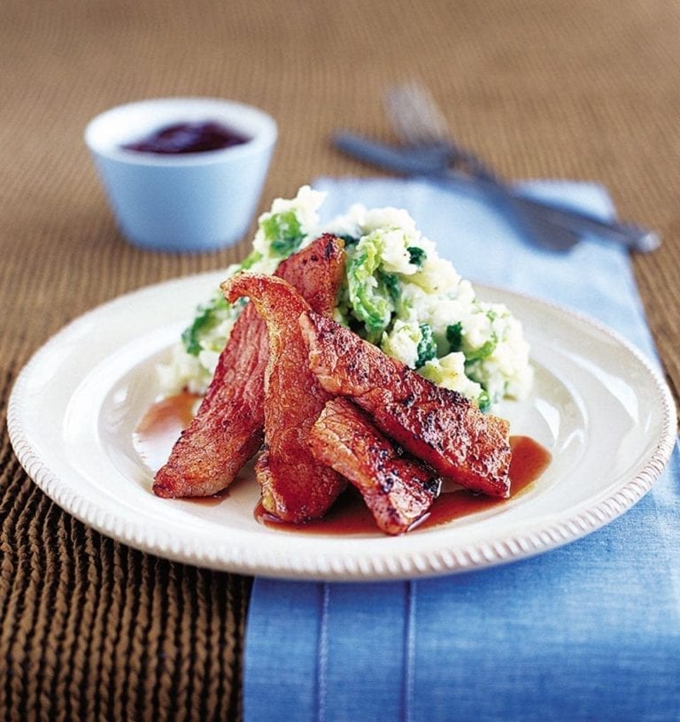 Gammon steaks with colcannon and redcurrant sauce