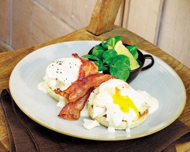 Smoked haddock, bacon and eggs on muffins