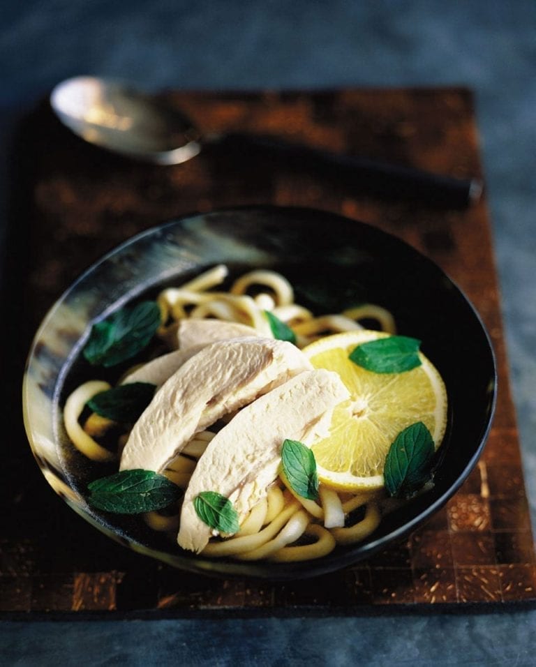 Chicken noodle soup with mint and lemon