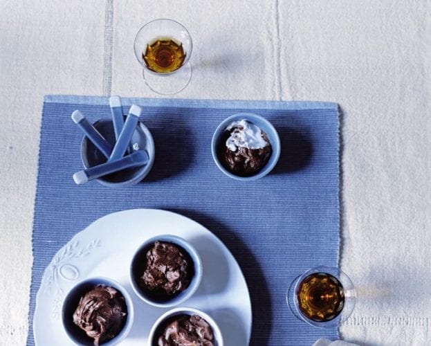 Chocolate fudge pots with blueberries in cassis