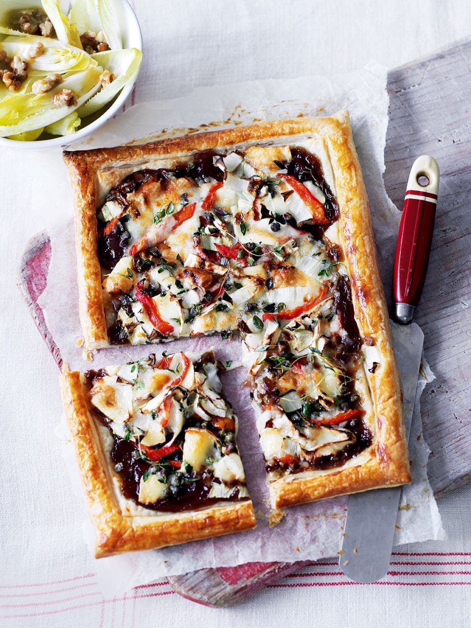 Goat's cheese and red pepper tart with chicory recipe delicious. magazine