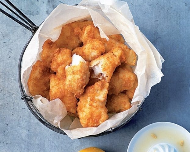 Herby chicken goujons with crispy new potatoes