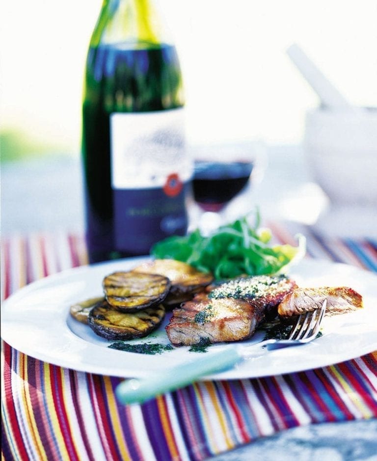 Seared steaks with fresh salmoriglio and potato slices