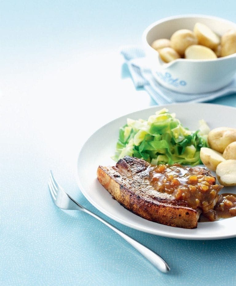 Pork chops with chutney sauce and greens