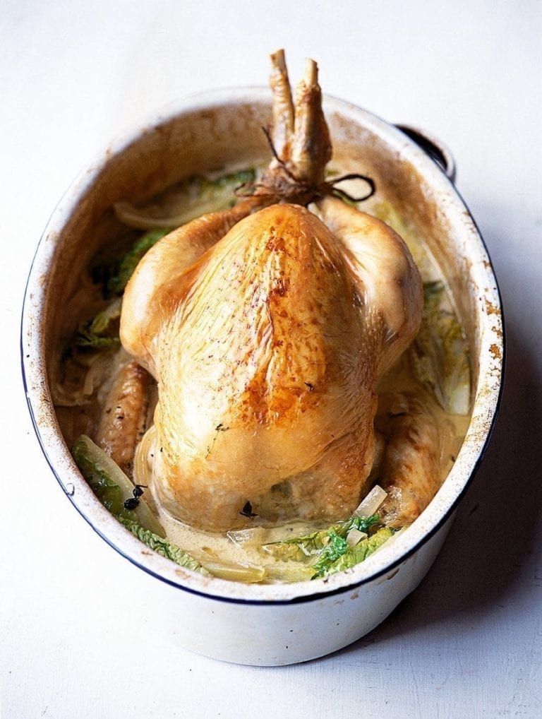 Pot-roast cider chicken with creamy onions and gem lettuce