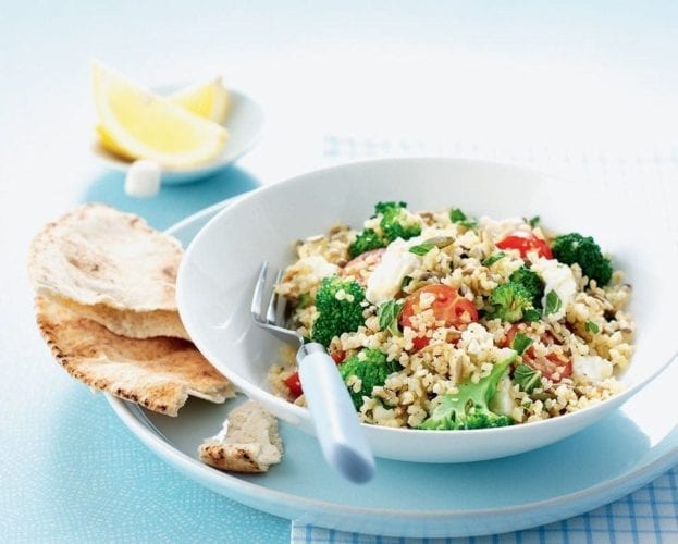 Green beans, bulgur, feta and pomegranate with sunflower seed dressing