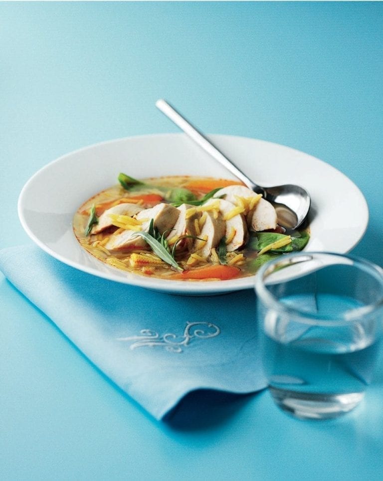 Poached chicken and rice broth