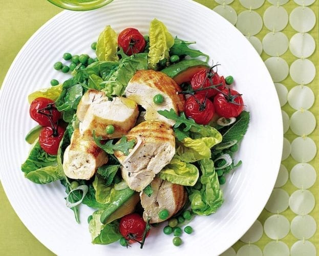 Chargrilled chicken with roasted tomatoes, avocado, peas and mint