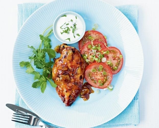 Spiced mango chicken with tomato and spring onion salad