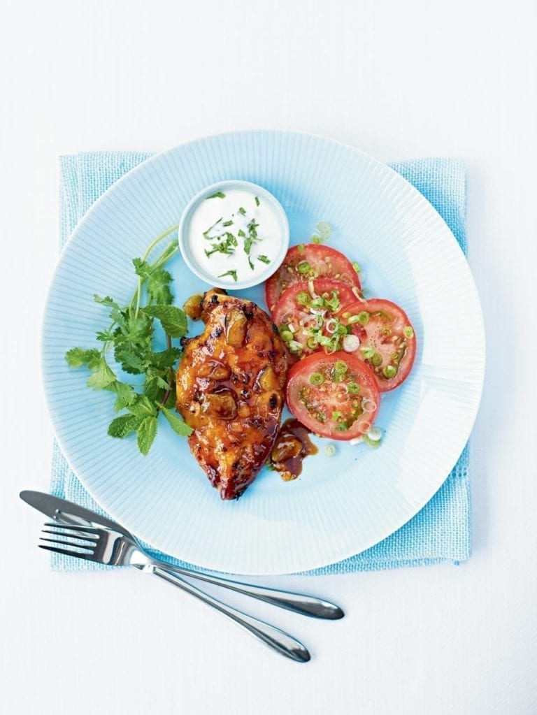 Spiced mango chicken with tomato and spring onion salad