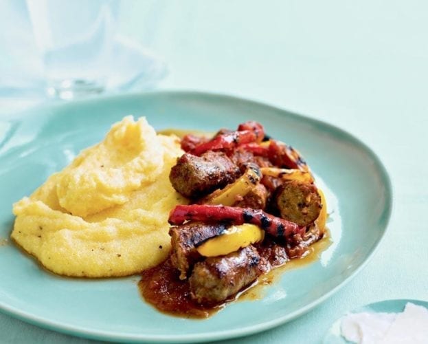 Sausages with polenta and braised courgettes