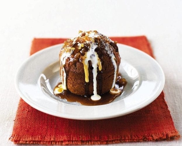 Individual stem ginger pudding shown on a white plate