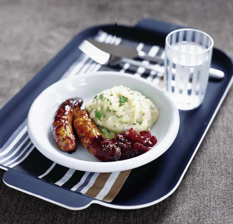 Sausages with three-veg mash and cranberry onions