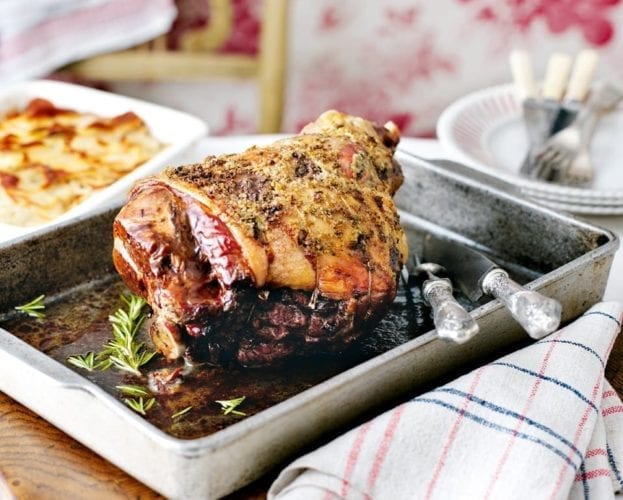 Apricot stuffed lamb shoulder with rosemary roast potatoes