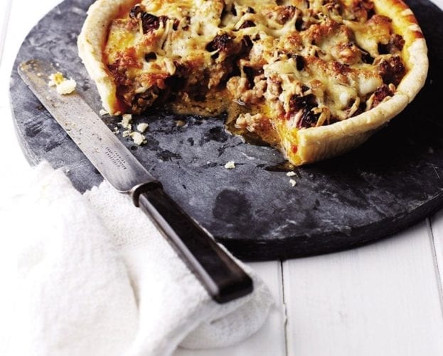 Spiced sausage and red onion tart