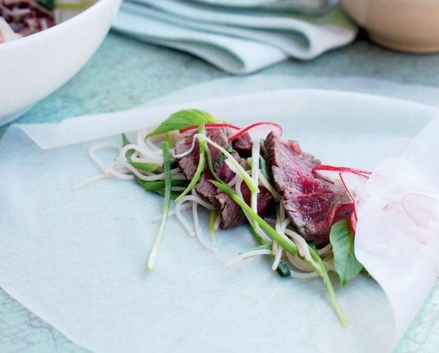 Vietnamese rolls with radishes and seared beef
