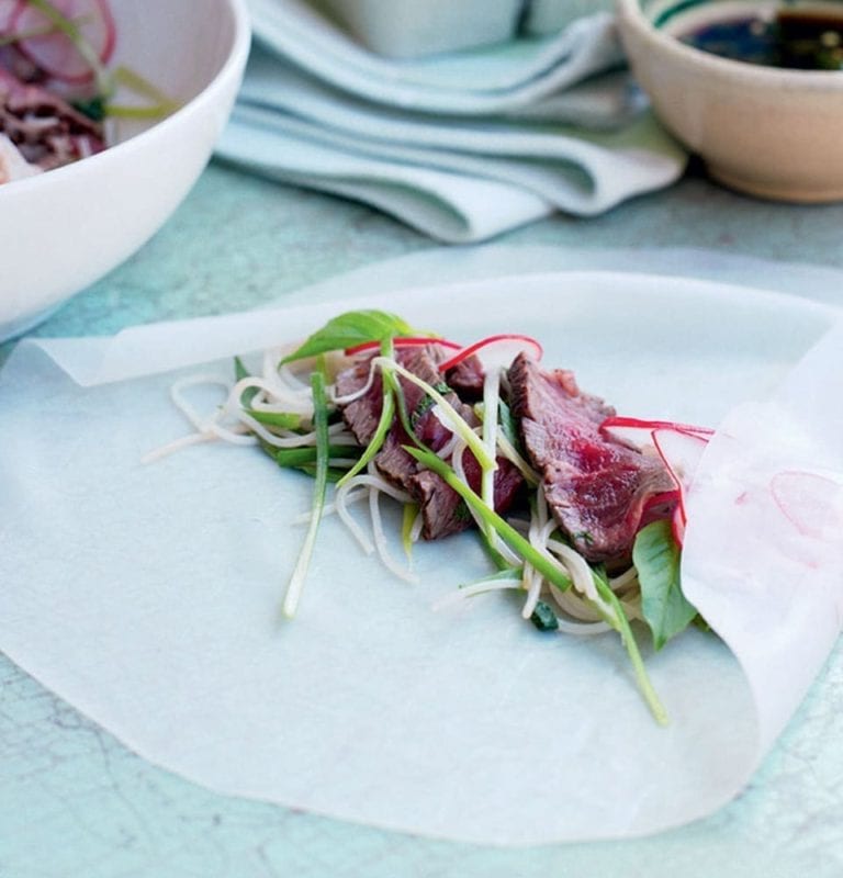 Vietnamese rolls with radishes and seared beef